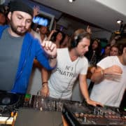 Swedish House Mafia - Steve Angello, Axwell and Sebastian Ingrosso at Café Mambo in Ibiza (Summer 2011) Author: Kevindougans. Wikimedia Commons CC BY-SA 3.0