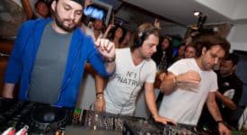 Swedish House Mafia - Steve Angello, Axwell and Sebastian Ingrosso at Café Mambo in Ibiza (Summer 2011) Author: Kevindougans. Wikimedia Commons CC BY-SA 3.0