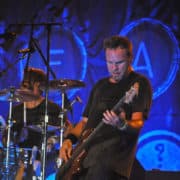 Bassist Jeff Ament performing with Pearl Jam. Author: Craig Carper. (Wikimedia Commons, CC BY 2.0)