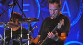 Bassist Jeff Ament performing with Pearl Jam. Author: Craig Carper. (Wikimedia Commons, CC BY 2.0)